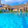 a swimming pool in front of a building