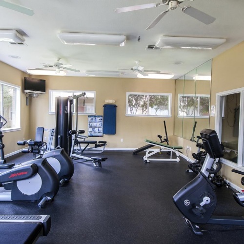 Get your workout on a room with exercise equipment