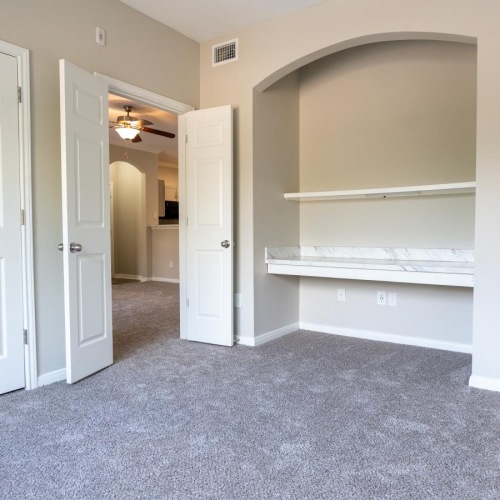 Generous bedroom offerings to fit every family a bedroom with carpet and a desk